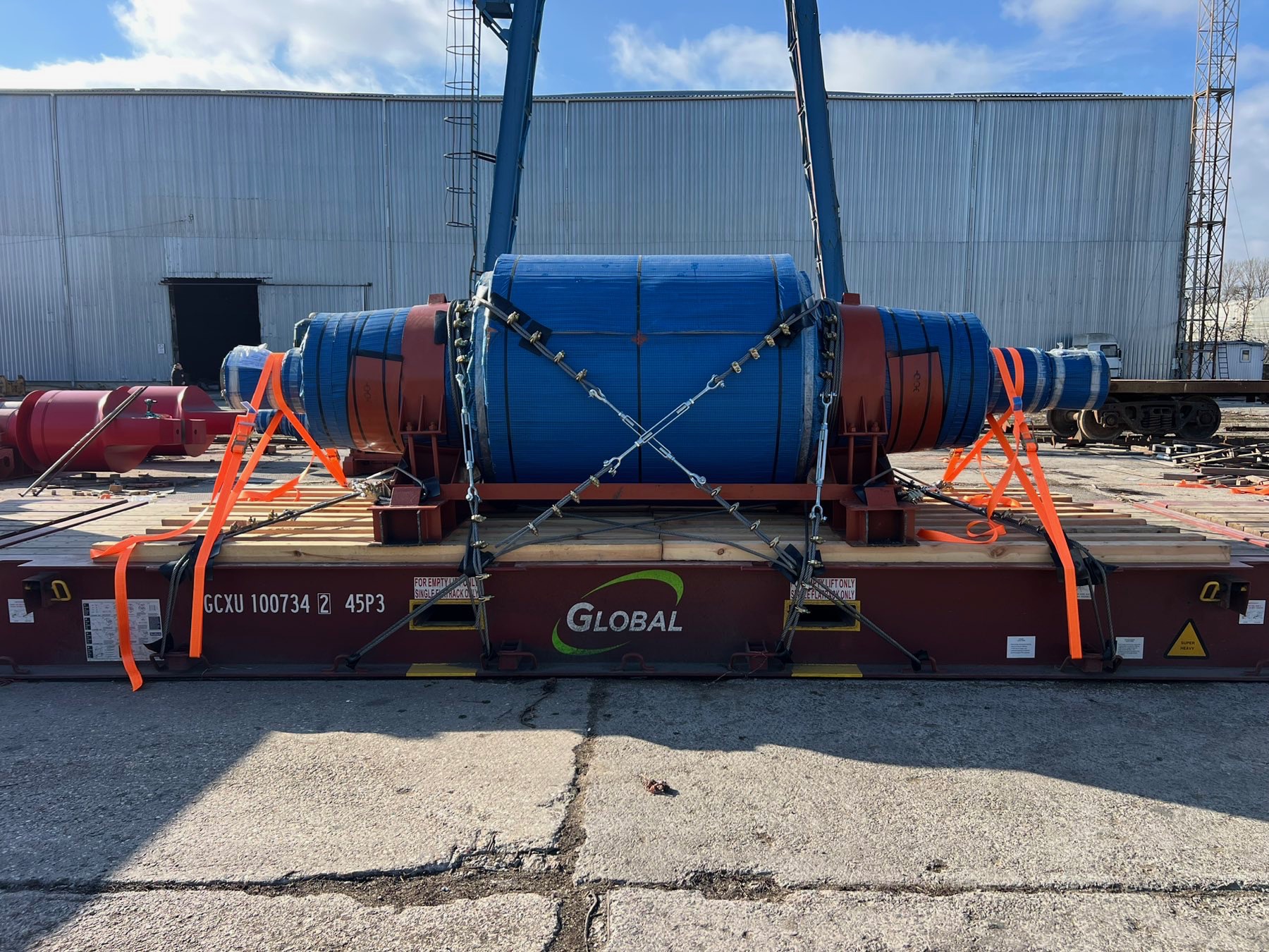 NOVALOG OOG mill rollers secured on Maersk flat-rack containers at an Odesa-area container port